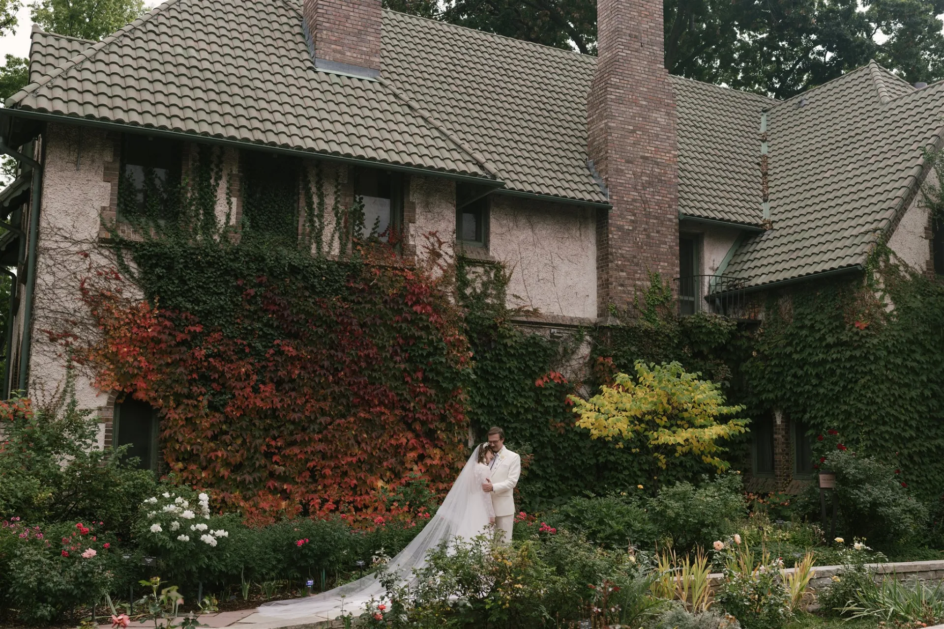 Whimsical couples wide shot in the Denver Botanic Gardens